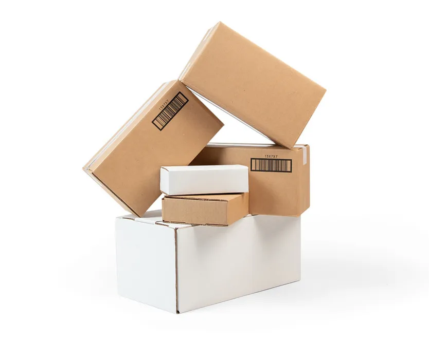 Stacks of custom-manufactured corrugated boxes ready to ship